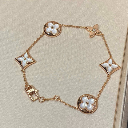 [BLUE TEARS]STAR AND SUN 5 MOTIF MOP PINK GOLD BRACELET